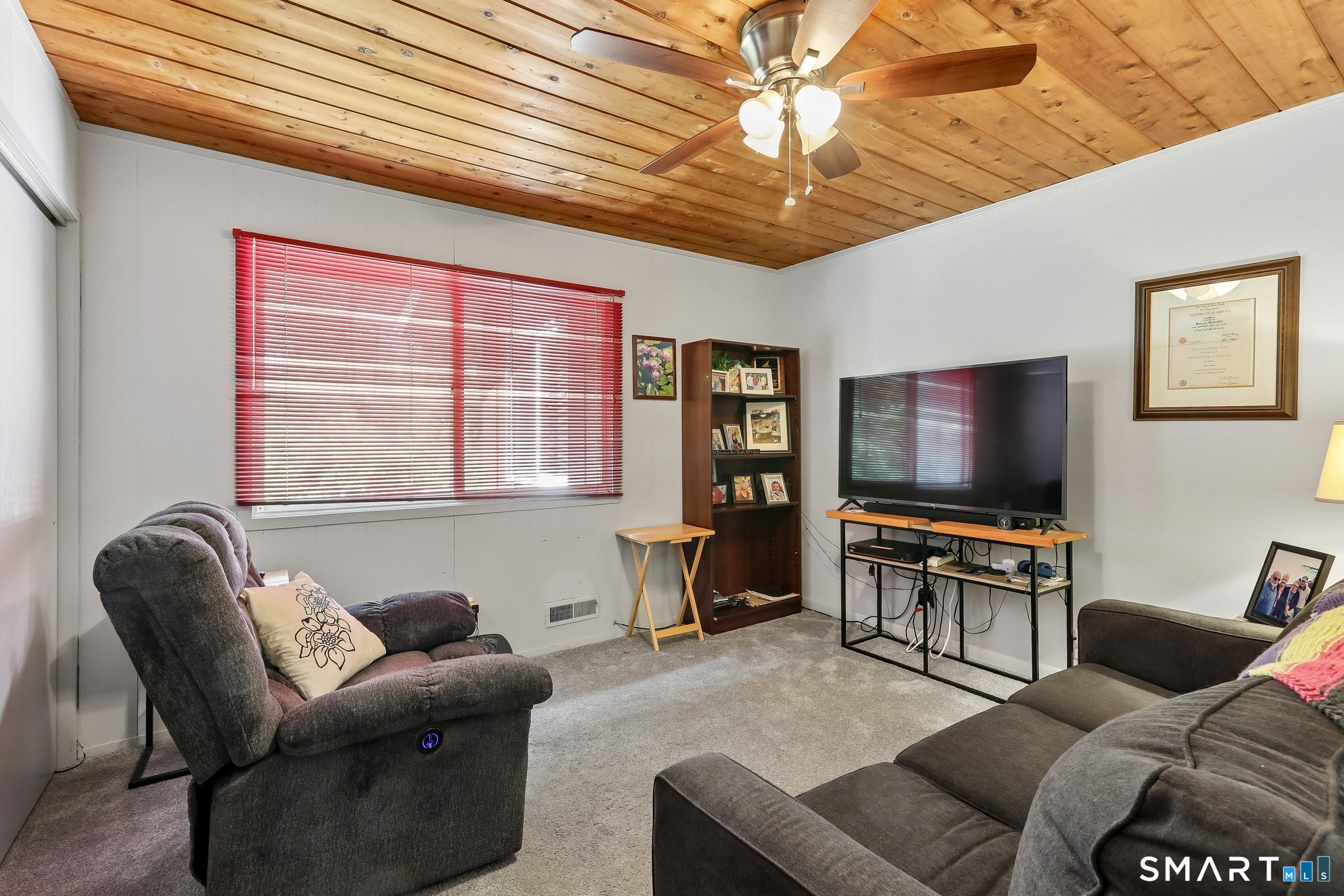 4 Alan Road Danbury, CT 06810 - Photo 14 of 38 a living room with furniture and a flat screen tv