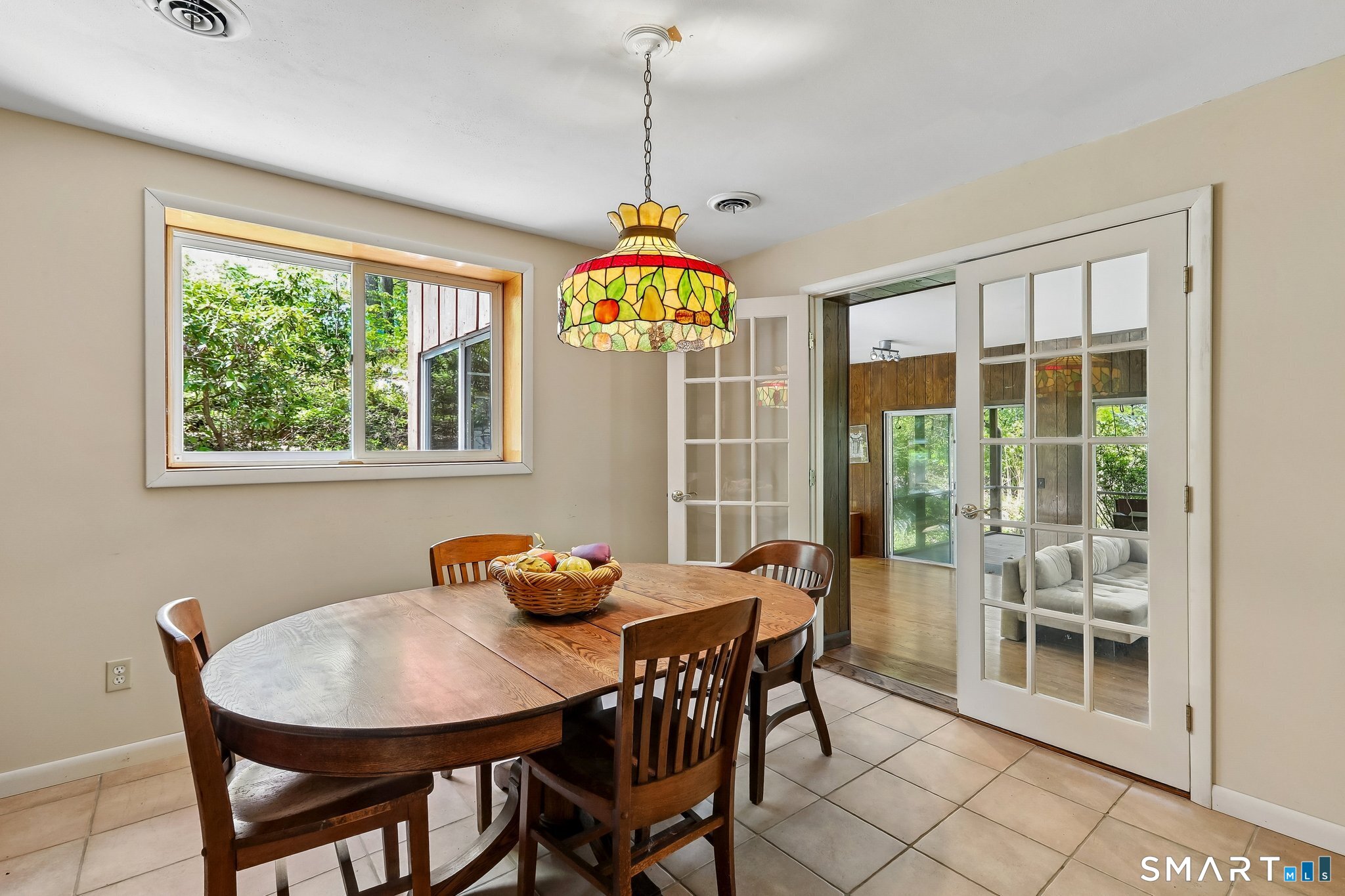 4 Alan Road Danbury, CT 06810 - Photo 23 of 38 a dining room with furniture a chandelier and window