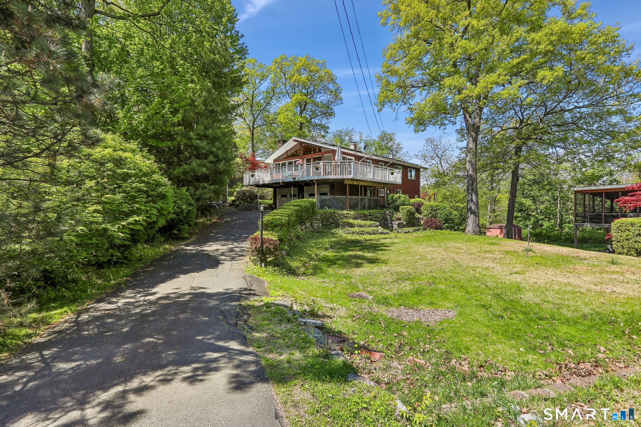 4 Alan Road Danbury, CT 06810 - Photo 31 of 38 a front view of a house with a yard