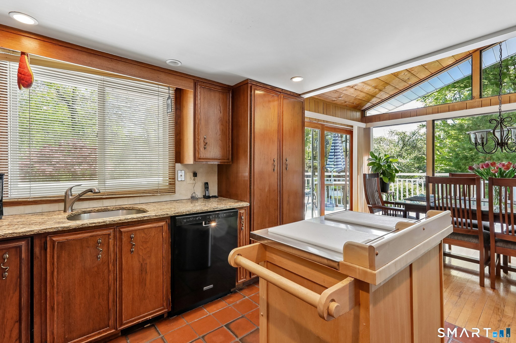 4 Alan Road Danbury, CT 06810 - Photo 10 of 38 a kitchen with a stove a sink and a refrigerator