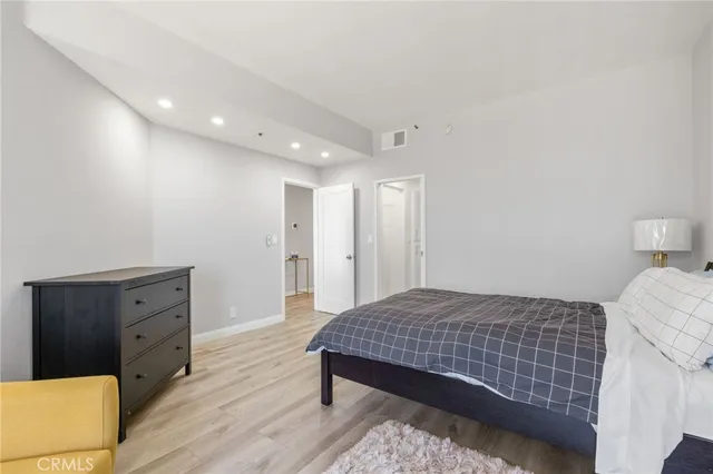 a blue couch sitting next to a blue wall