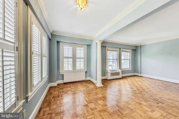 a view of an empty room and window