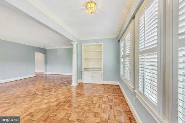 a view of an empty room and window