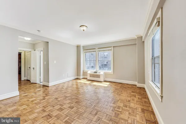 a view of an empty room with a window