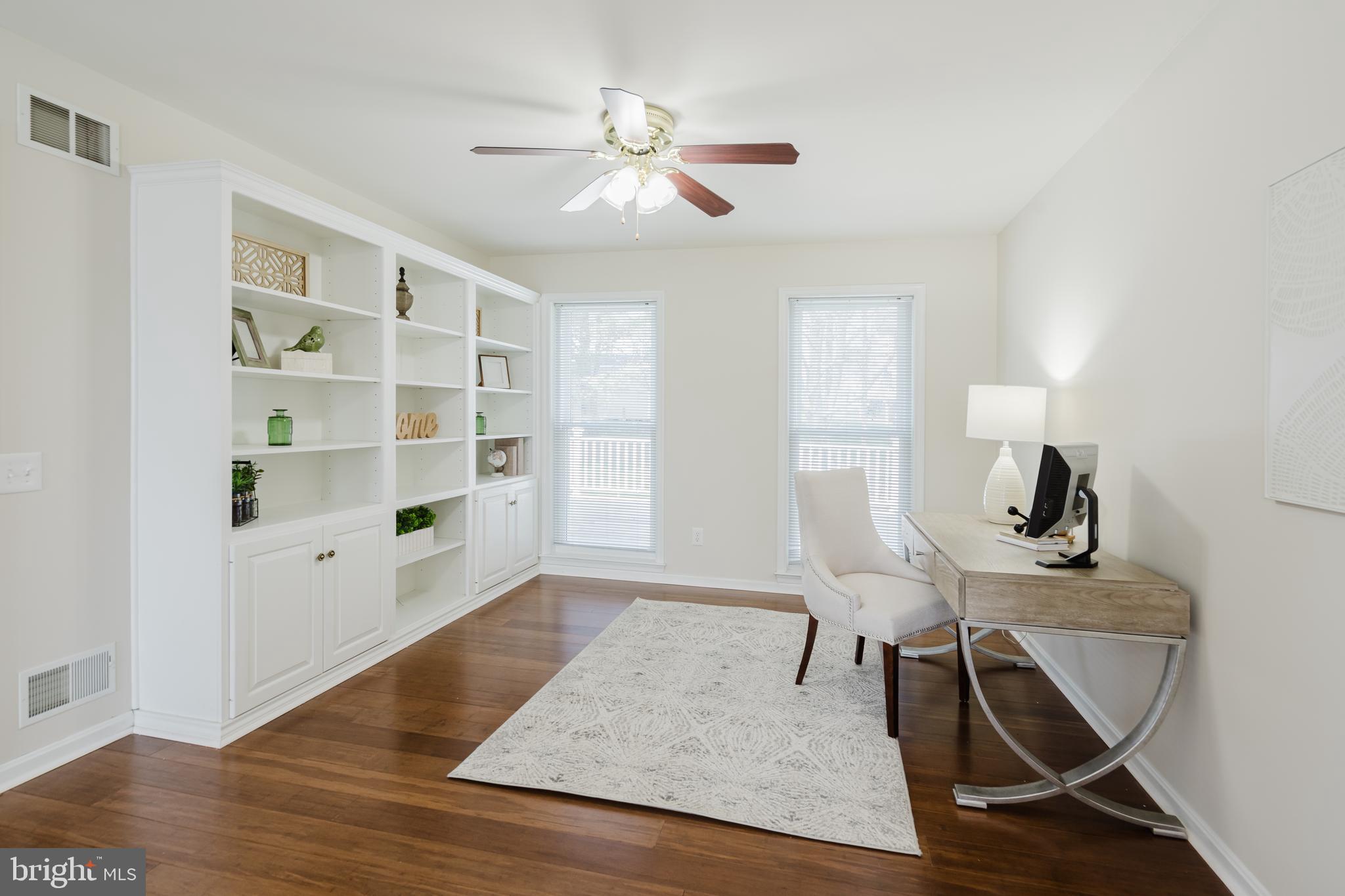 33 Hummingbird Lane Newark, DE 19711 - Photo 14 of 61 a view of a workspace with furniture and a window