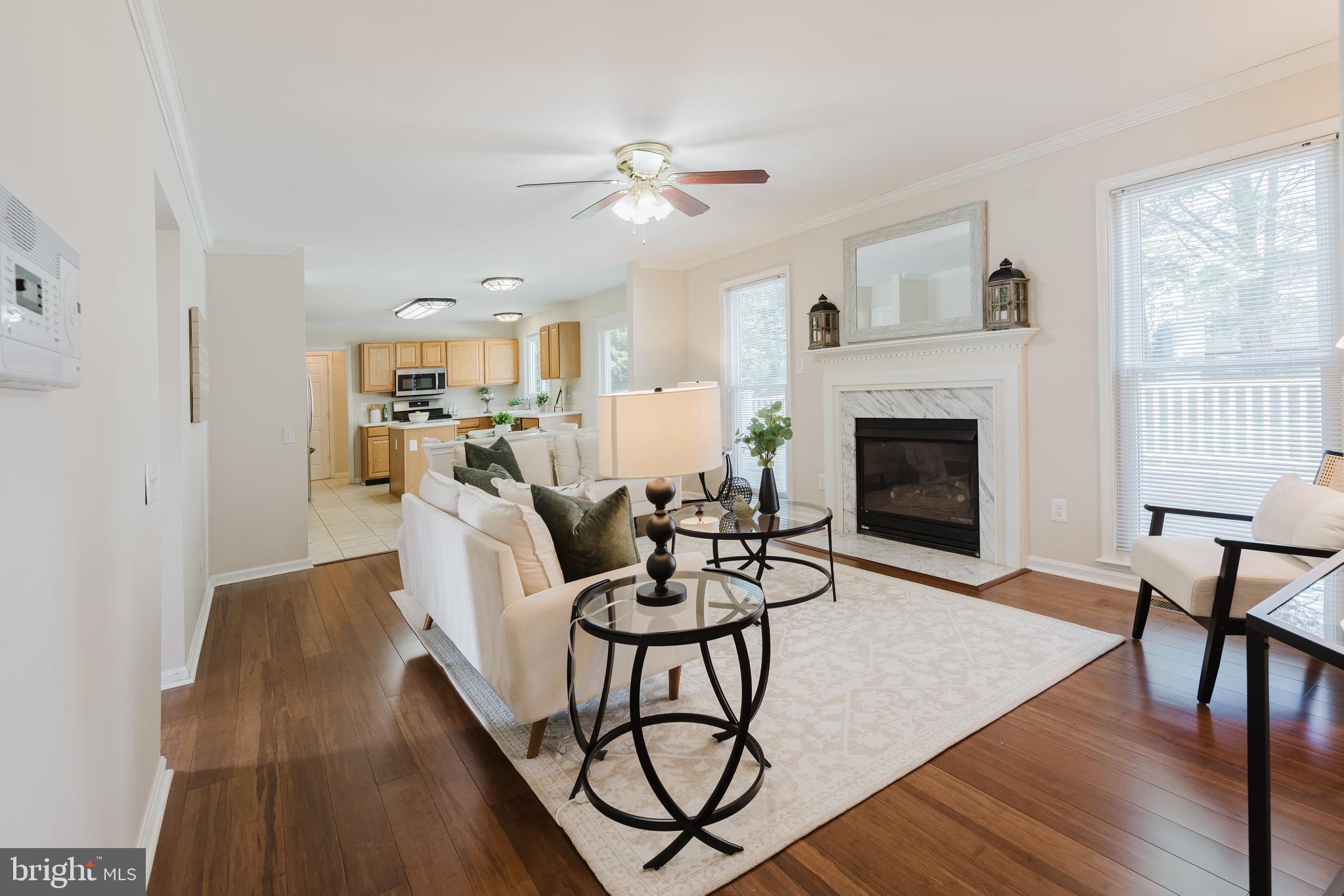 33 Hummingbird Lane Newark, DE 19711 - Photo 16 of 61 a living room with furniture a fireplace and a table