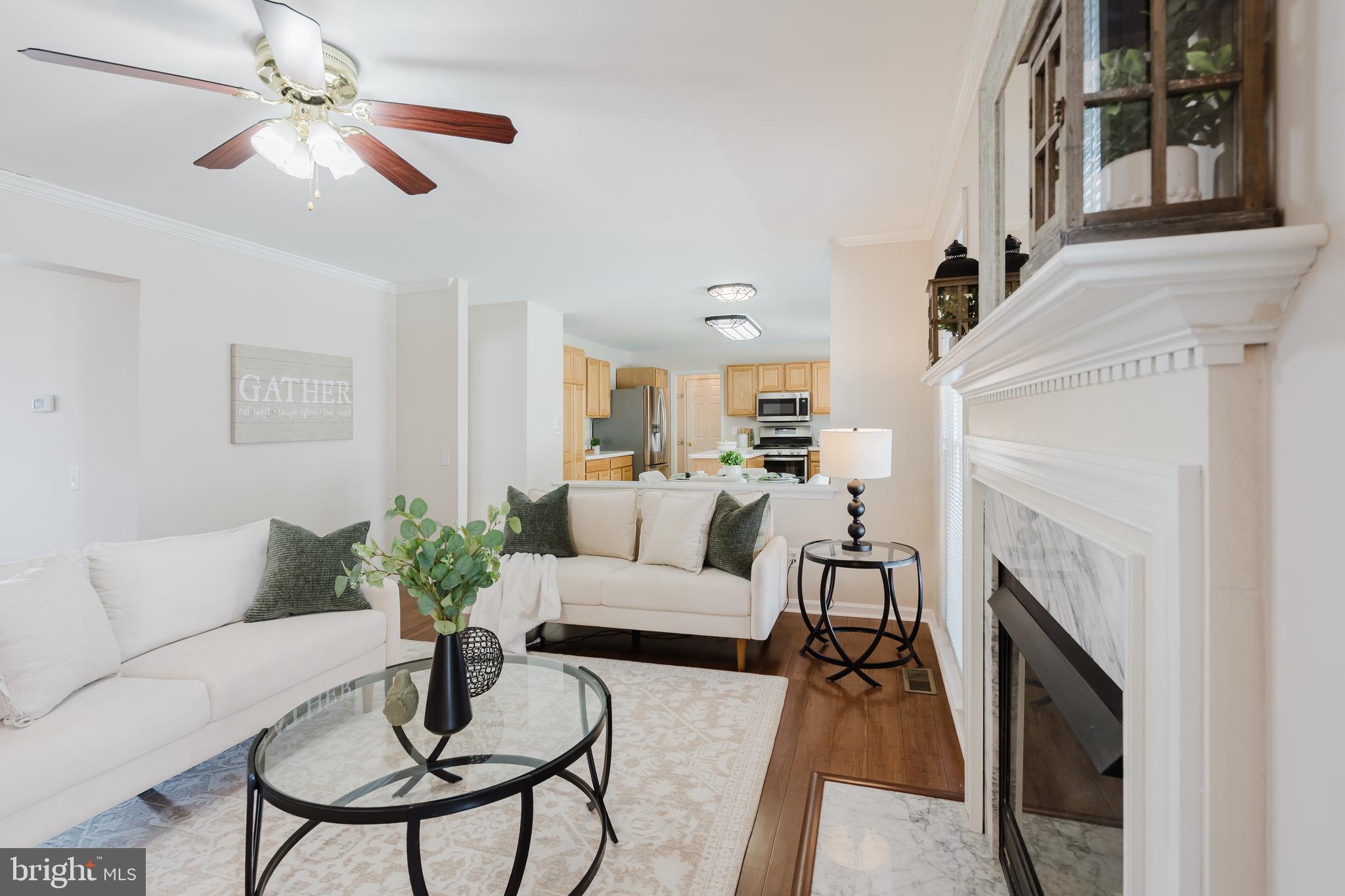 33 Hummingbird Lane Newark, DE 19711 - Photo 18 of 61 a living room with furniture and a fireplace