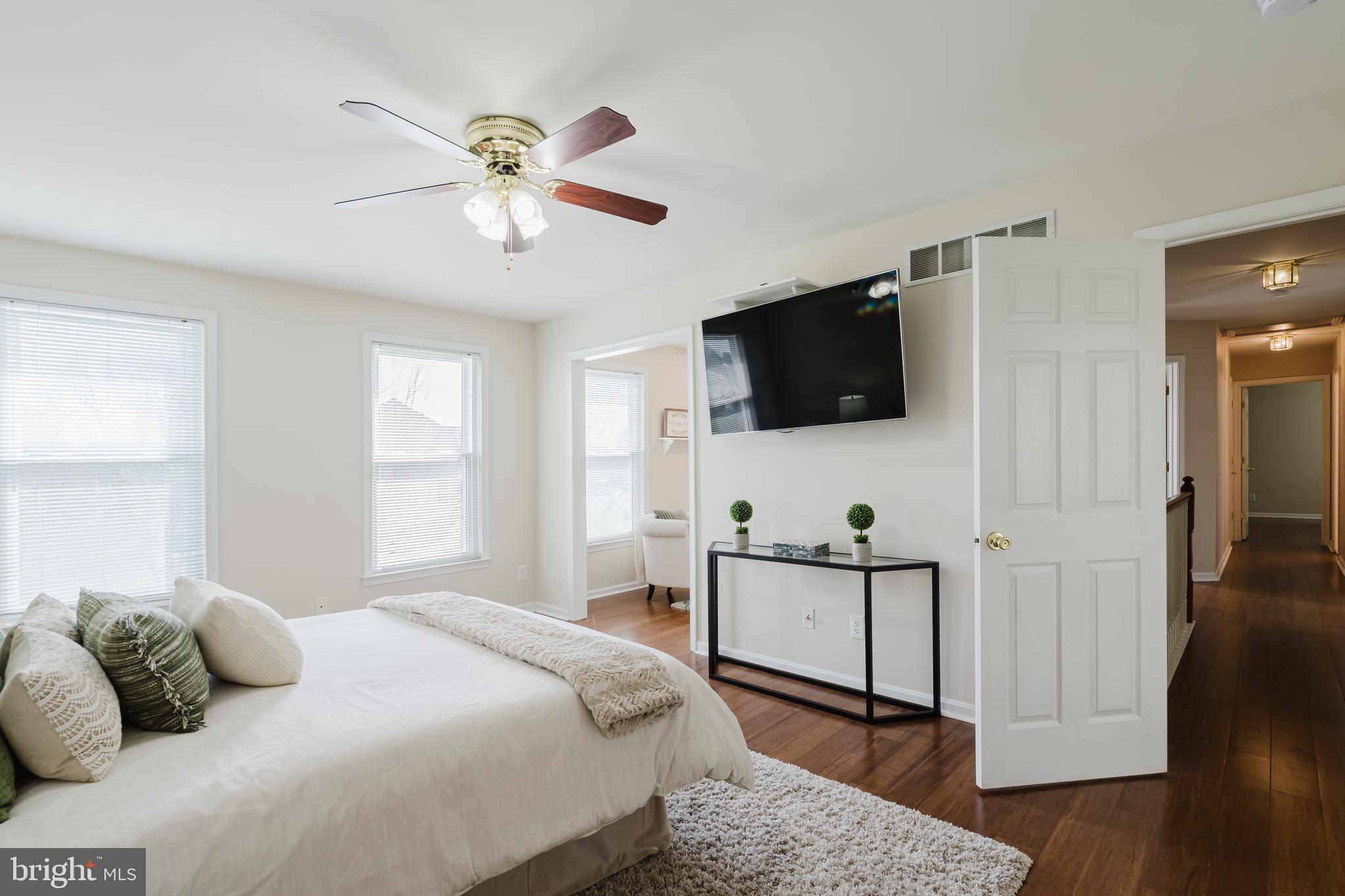 33 Hummingbird Lane Newark, DE 19711 - Photo 29 of 61 a bedroom with a bed a window and flat screen tv