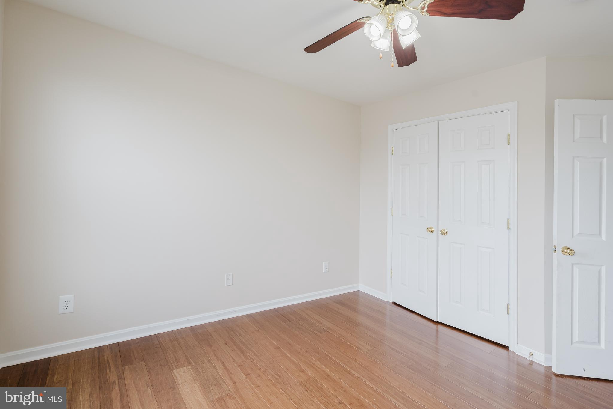 33 Hummingbird Lane Newark, DE 19711 - Photo 42 of 61 a view of an empty room with wooden floor