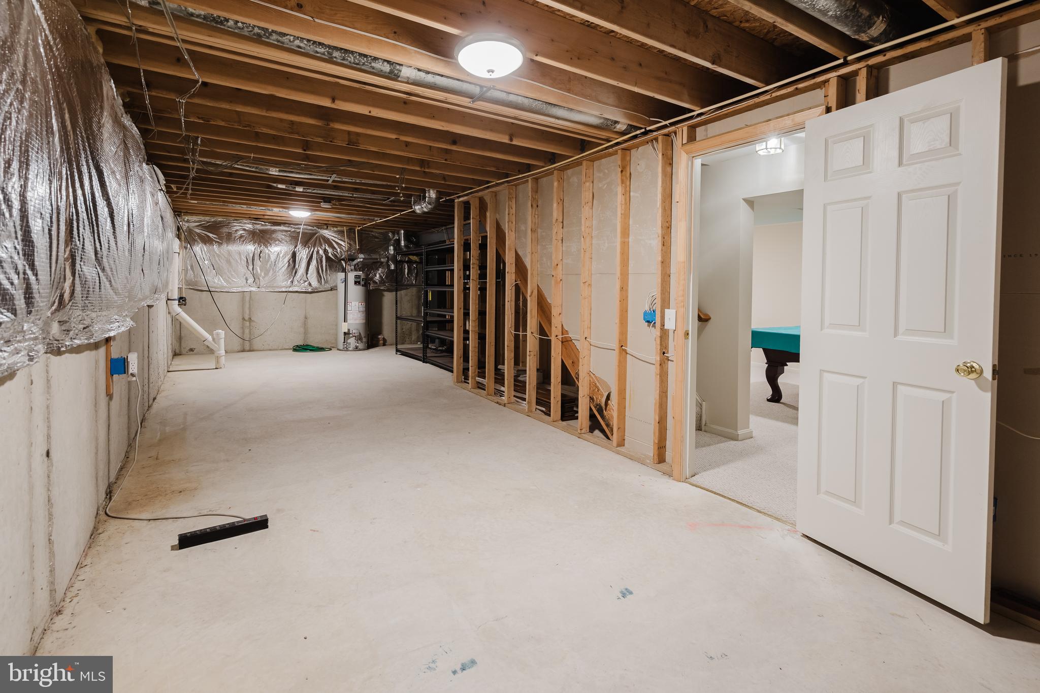 33 Hummingbird Lane Newark, DE 19711 - Photo 48 of 61 a view of hallway with wooden stairs