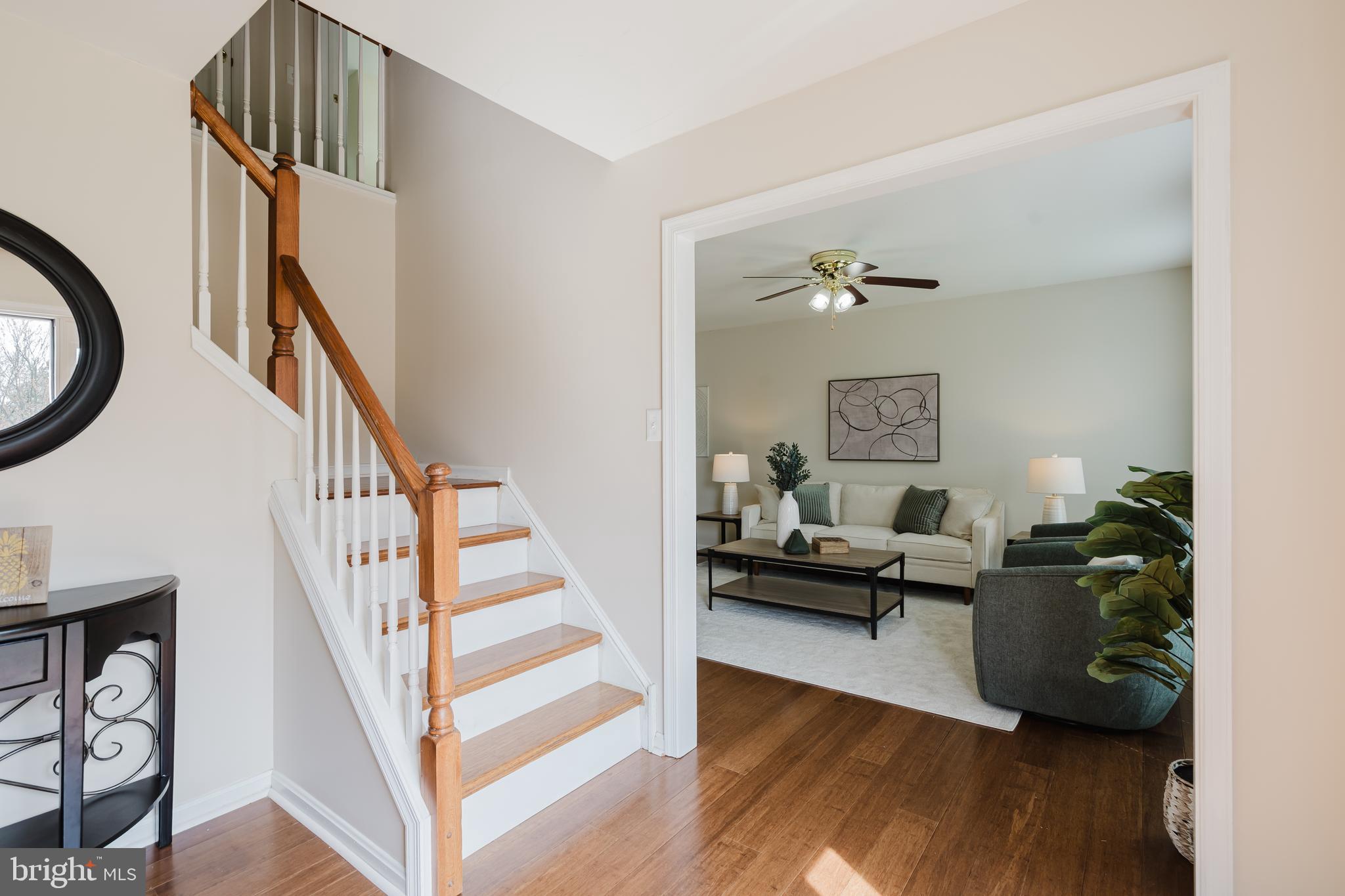 33 Hummingbird Lane Newark, DE 19711 - Photo 6 of 61 a living room with furniture and a wooden floor