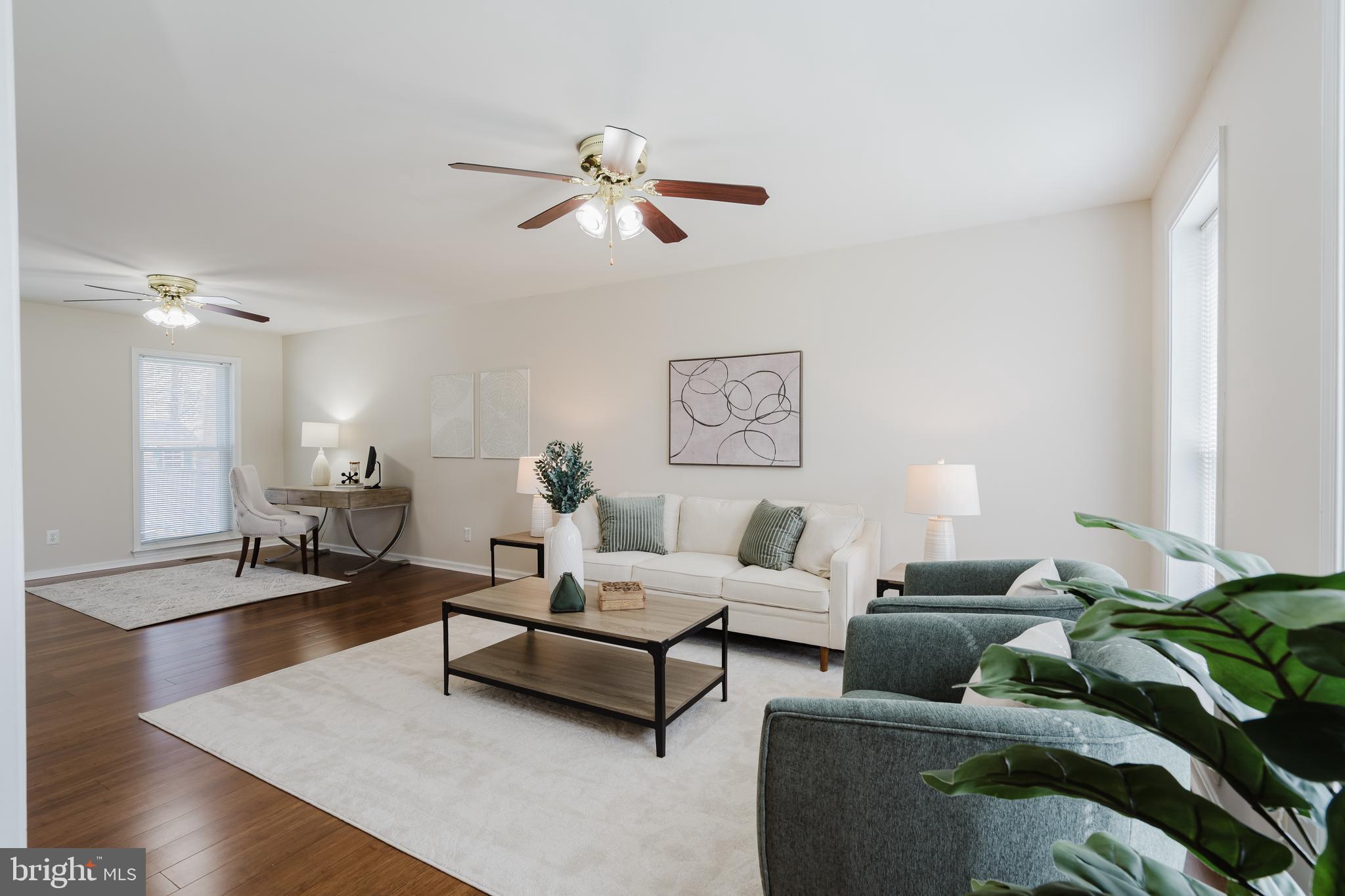 33 Hummingbird Lane Newark, DE 19711 - Photo 10 of 61 a living room with furniture and wooden floor