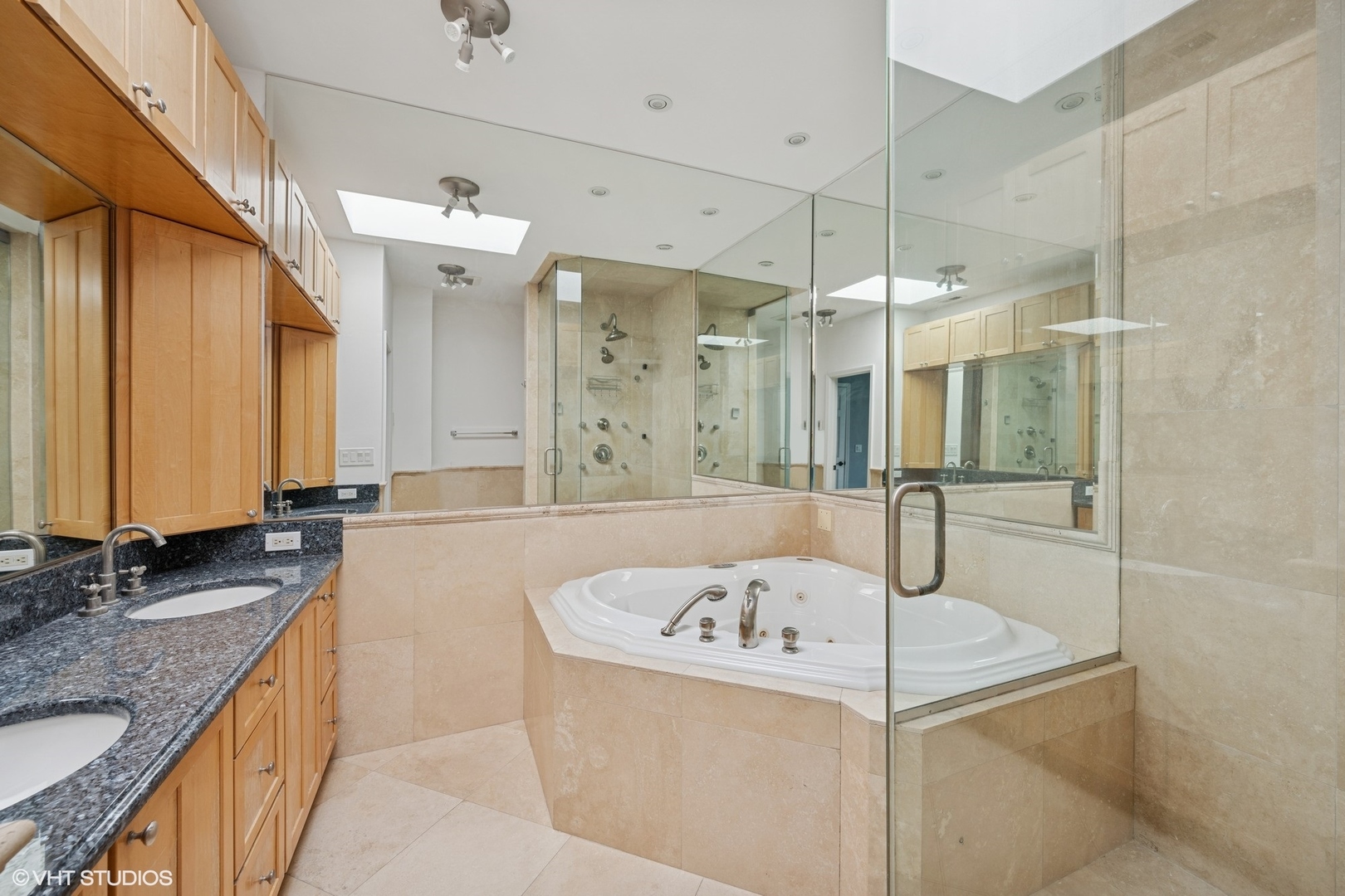 1 Renaissance Place, Unit 3PH Palatine, IL 60067 - Photo 12 of 28 a bathroom with a granite countertop sink a large mirror and a bathtub