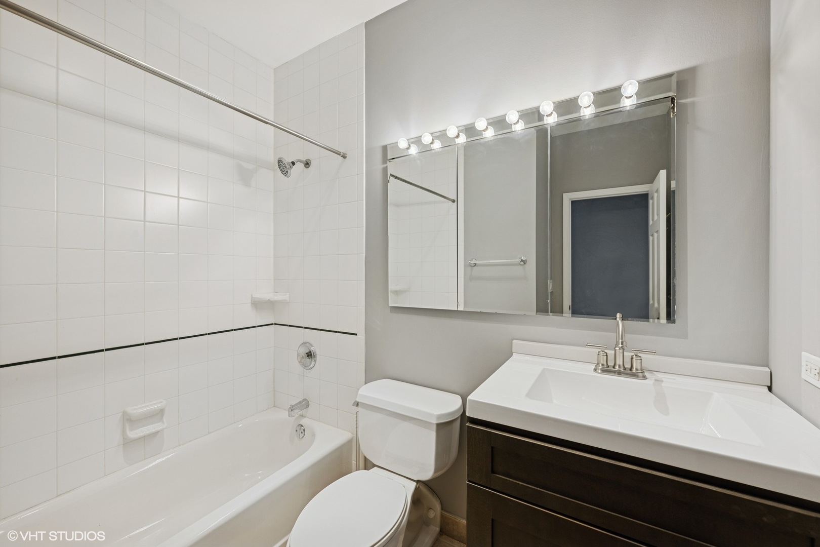 1 Renaissance Place, Unit 3PH Palatine, IL 60067 - Photo 14 of 28 a bathroom with a sink a toilet and shower