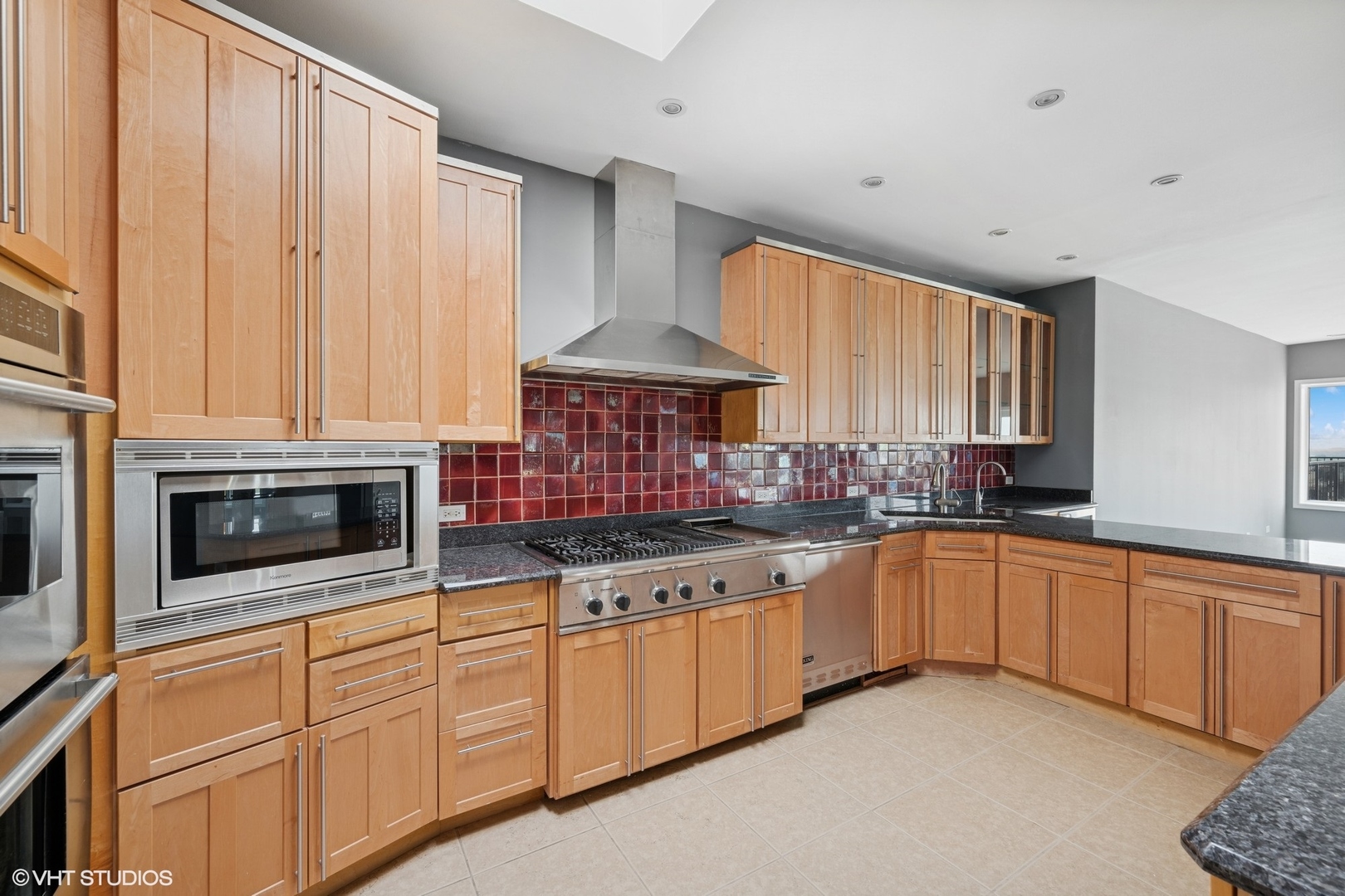 1 Renaissance Place, Unit 3PH Palatine, IL 60067 - Photo 8 of 28 a kitchen with stainless steel appliances granite countertop a stove sink and cabinets