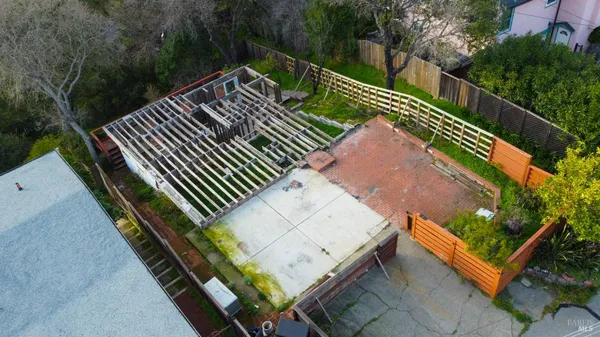 a view of a patio with a bench