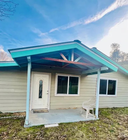 a view of a house with a swimming pool