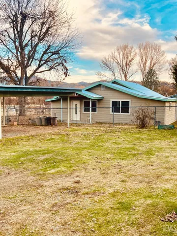 a view of a house with a swimming pool