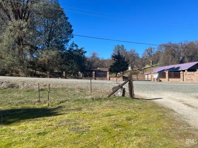 a view of a swimming pool with an outdoor seating