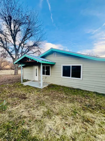 a front view of a house with garage