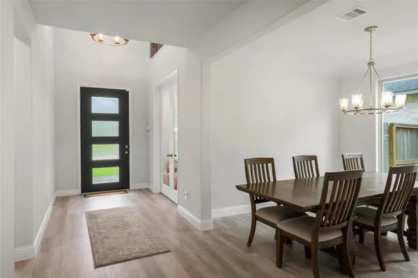 a view of a livingroom with furniture and window