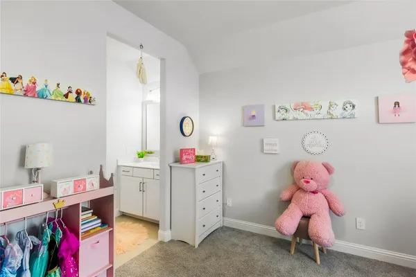 a room with toys and wooden floor