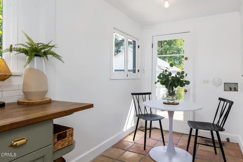 a view of a workspace with furniture