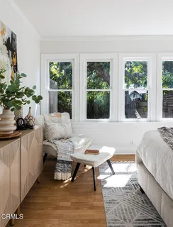a living room with furniture and a window