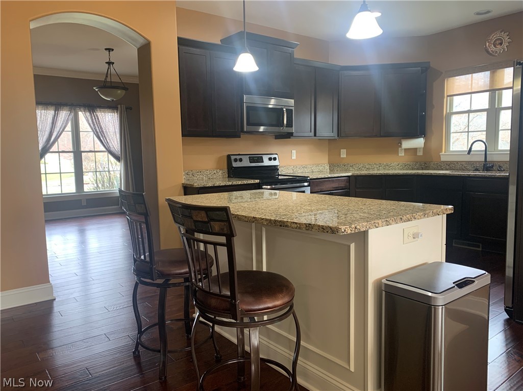 819 Brook Road Wadsworth, OH 44281 - Photo 10 of 35 Accent color center Island with pendant lighting.