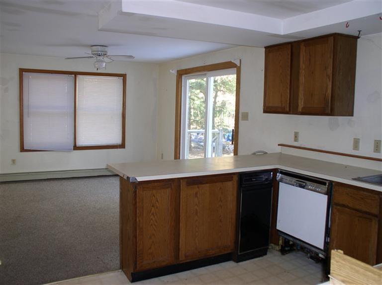 20 Jackbon Road Mashpee, MA 02649 - Photo 11 of 26 a kitchen with a sink and a window