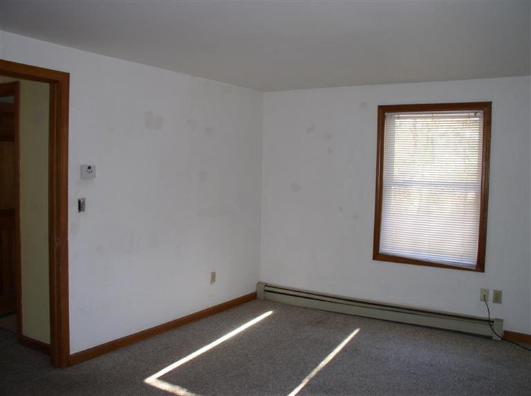 20 Jackbon Road Mashpee, MA 02649 - Photo 21 of 26 an empty room with windows
