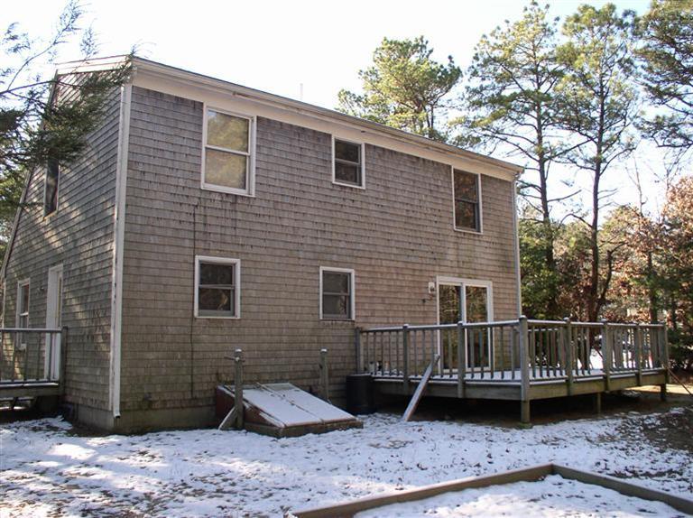 20 Jackbon Road Mashpee, MA 02649 - Photo 3 of 26 a view of a house with a yard