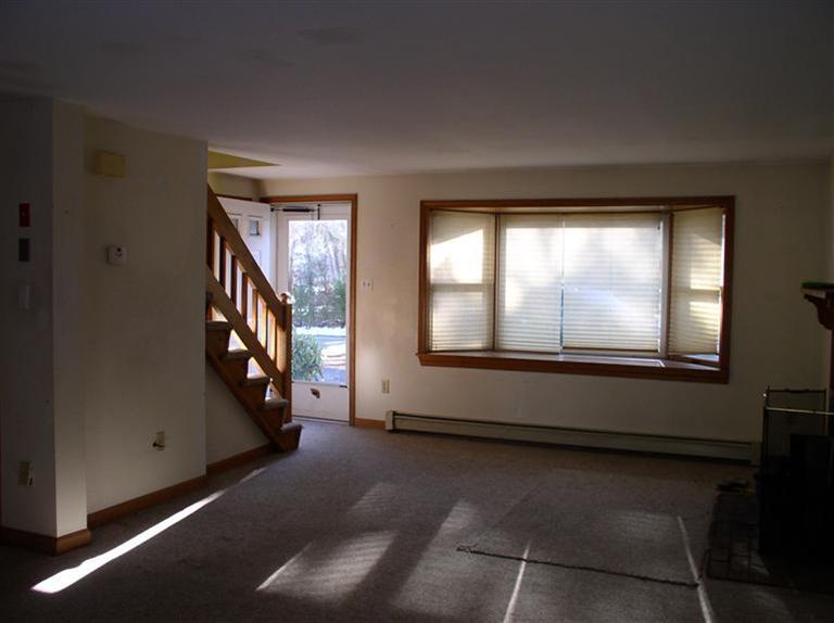 20 Jackbon Road Mashpee, MA 02649 - Photo 4 of 26 an empty room with windows