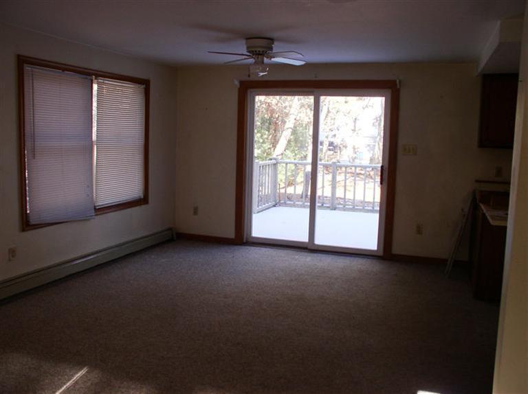 20 Jackbon Road Mashpee, MA 02649 - Photo 7 of 26 an empty room with windows