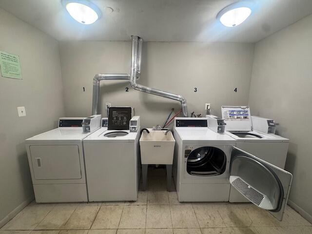 1101 Jefferson Avenue, Unit 6 Chesterton, IN 46304 - Photo 12 of 13 a utility room with dryer and washer