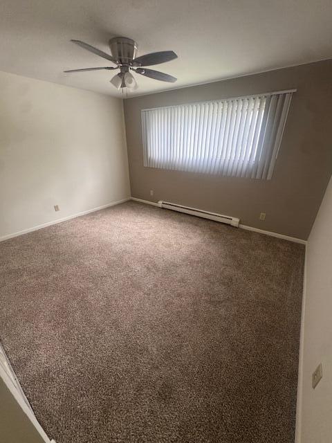 1101 Jefferson Avenue, Unit 6 Chesterton, IN 46304 - Photo 7 of 13 an empty room with windows and fan