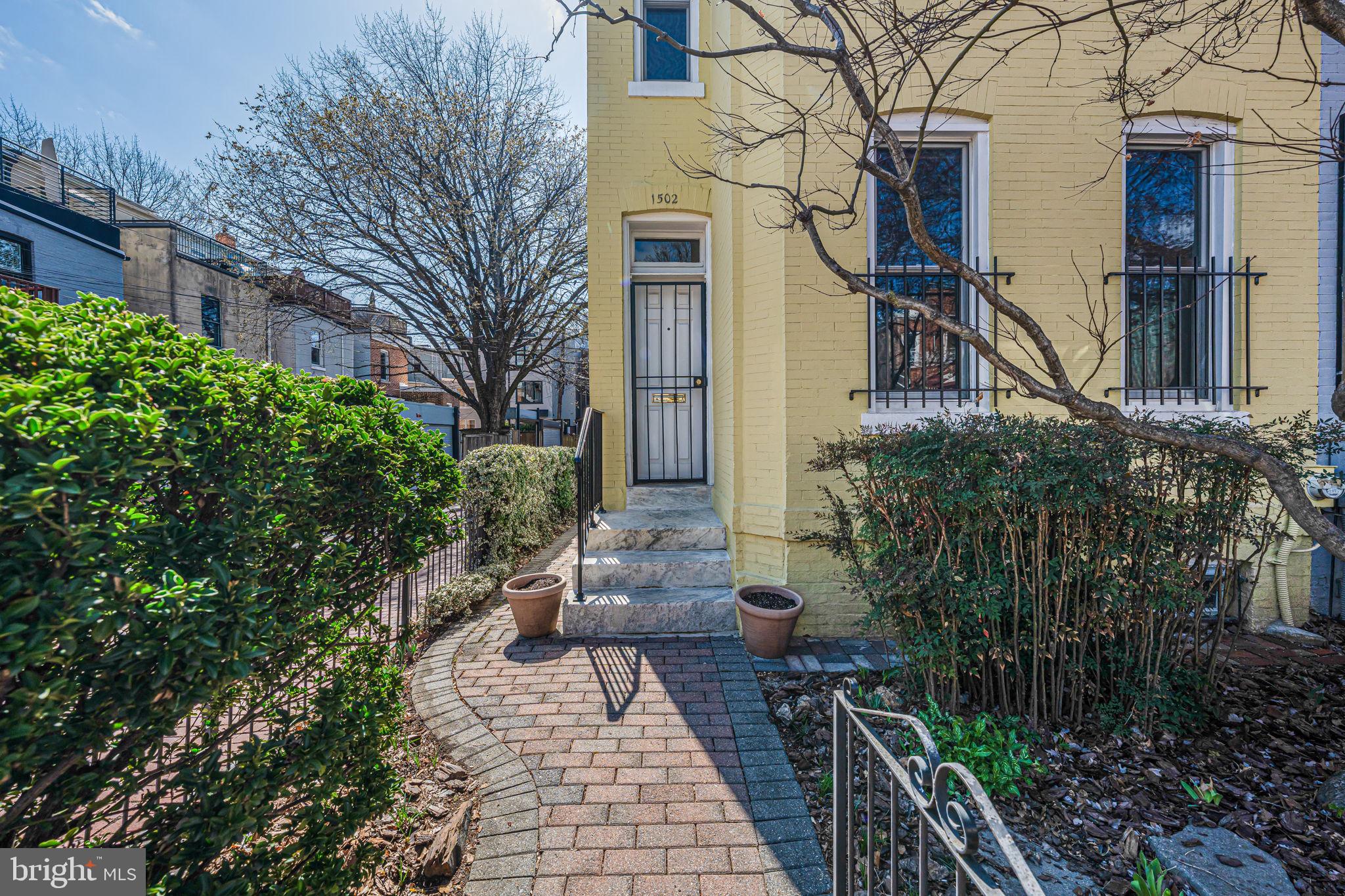 1502 Caroline Street Northwest Washington, DC 20009 - Photo 2 of 22 a house view with a outdoor space