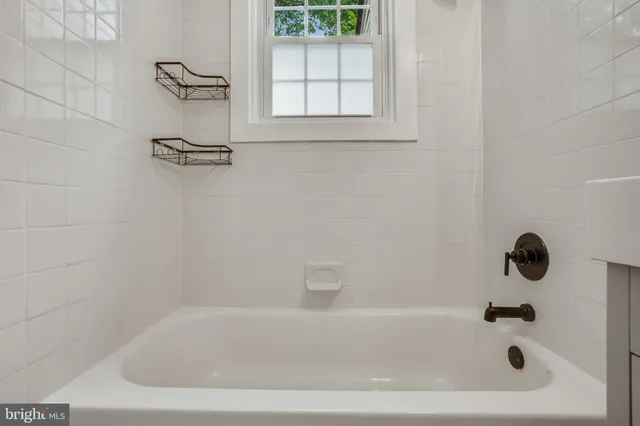 a bathroom with a bathtub