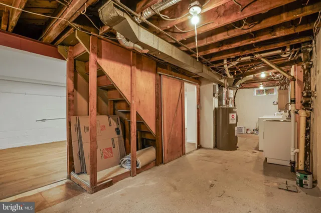 a backyard of a house with wooden floor and fence