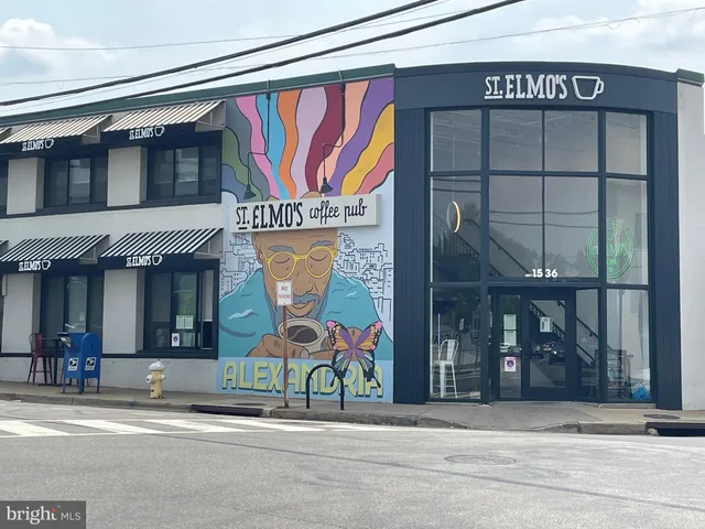 a view of a living room with a lots of people