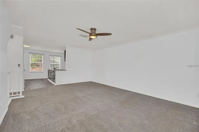 an empty room with windows