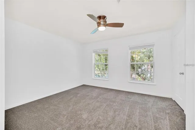 a bathroom with a toilet and bathtub