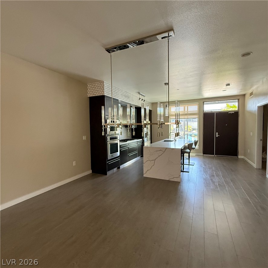 8925 West Flamingo Road, Unit 217 Las Vegas, NV 89147 - Photo 18 of 20 Kitchen and living room