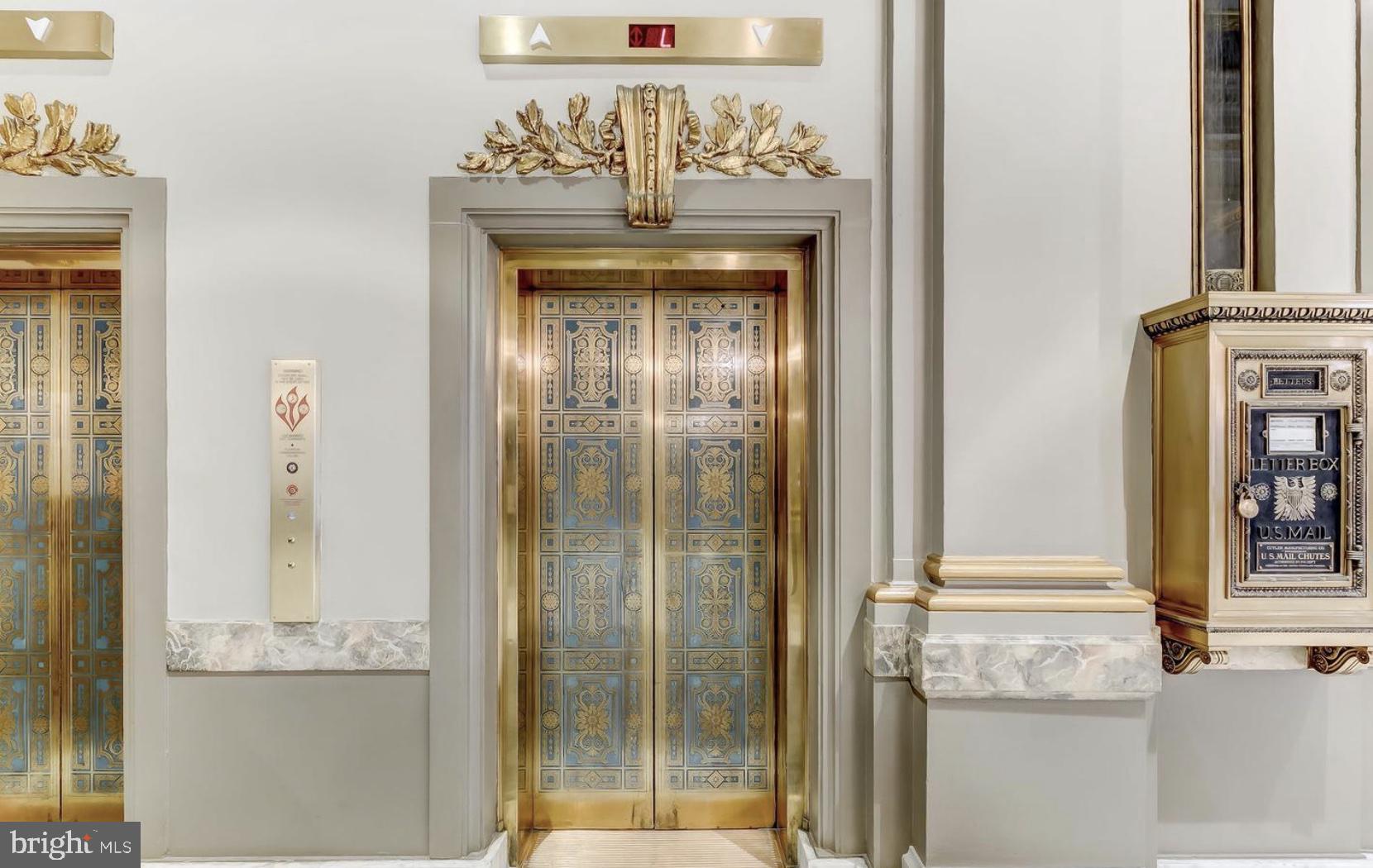 1 East Chase Street, Unit 804 Baltimore, MD 21202 - Photo 16 of 31 a view of a wooden door with a glass door