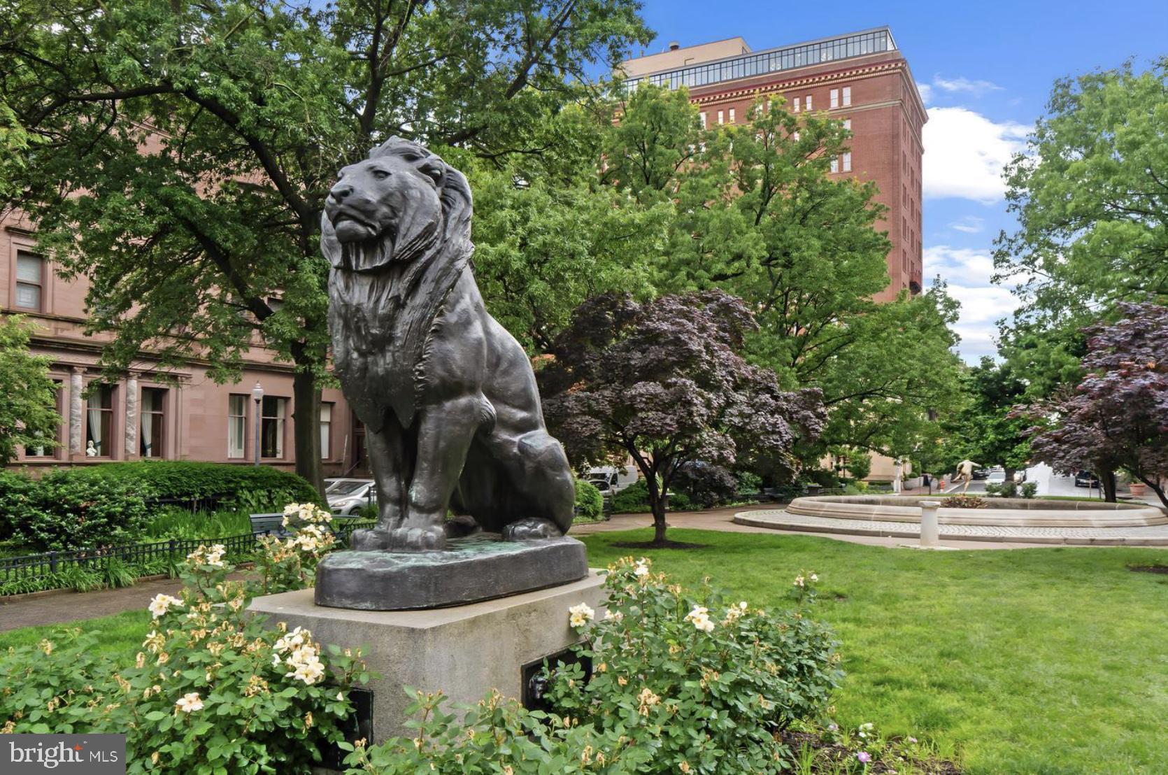 1 East Chase Street, Unit 804 Baltimore, MD 21202 - Photo 28 of 31 a front view of a house with a yard