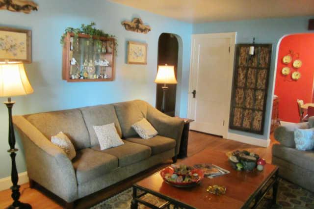 101 Eugene Road Columbia, TN 38401 - Photo 3 of 18 Note hardwood floor and arched doorway in living room