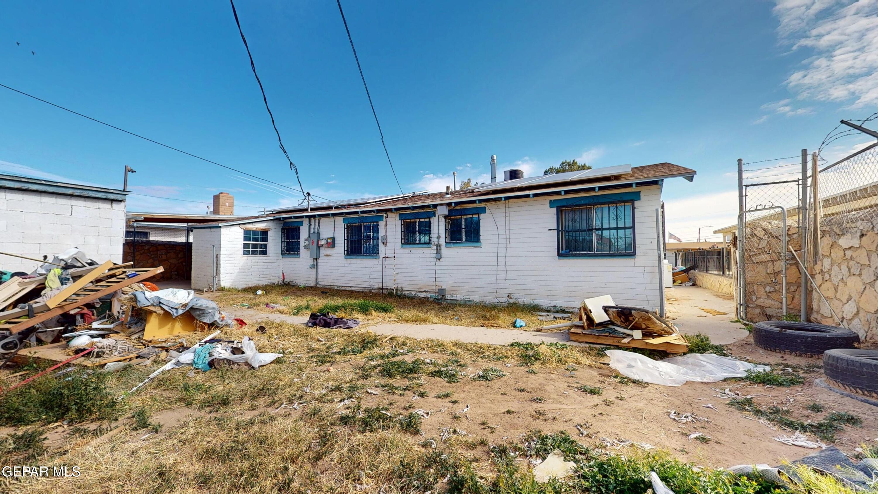 135 Baywood Road El Paso, TX 79915 - Photo 26 of 43 a view of a house with a backyard