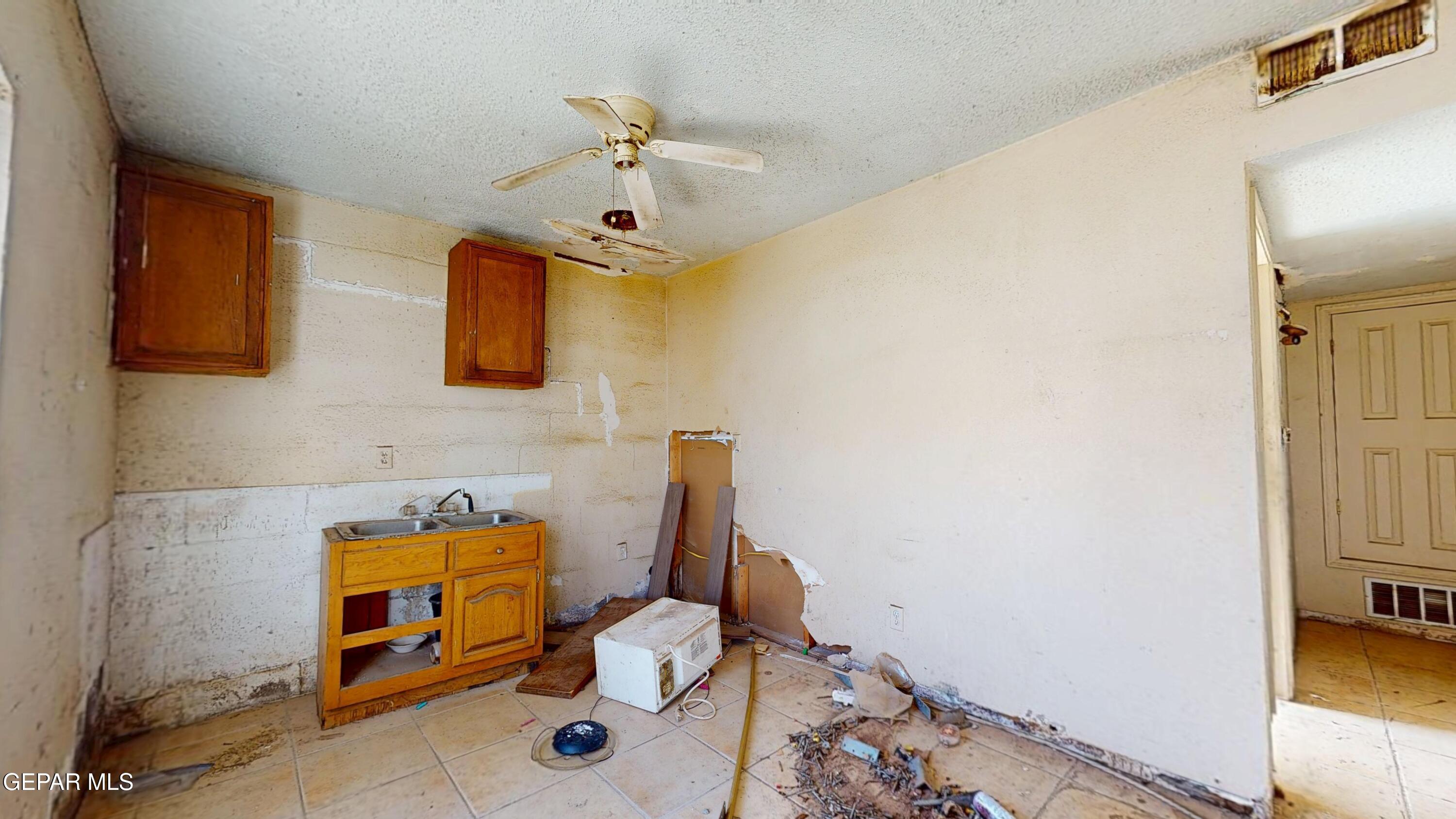 135 Baywood Road El Paso, TX 79915 - Photo 32 of 43 a view of a storage & utility room