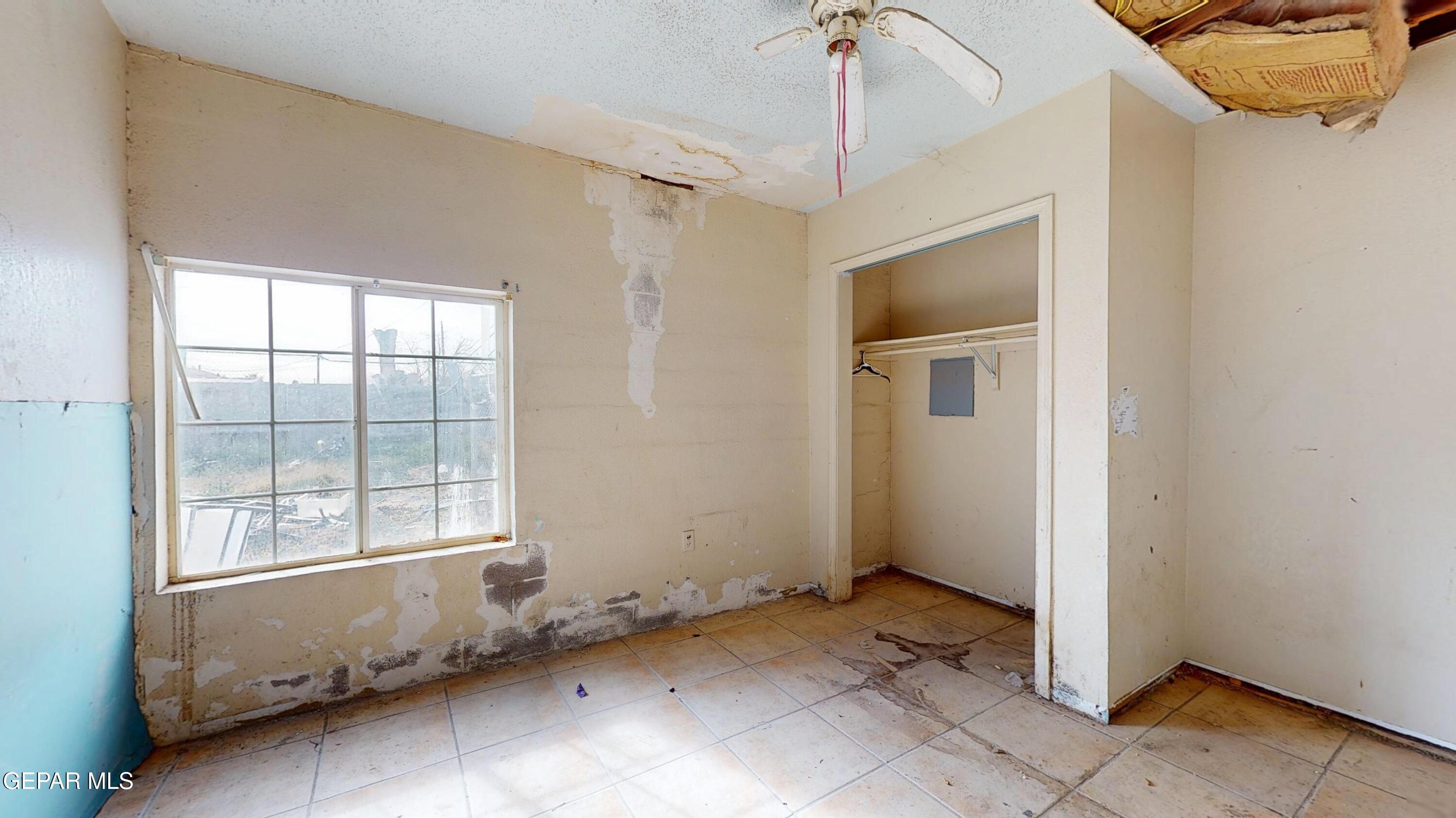 135 Baywood Road El Paso, TX 79915 - Photo 34 of 43 a view of an empty room with a window