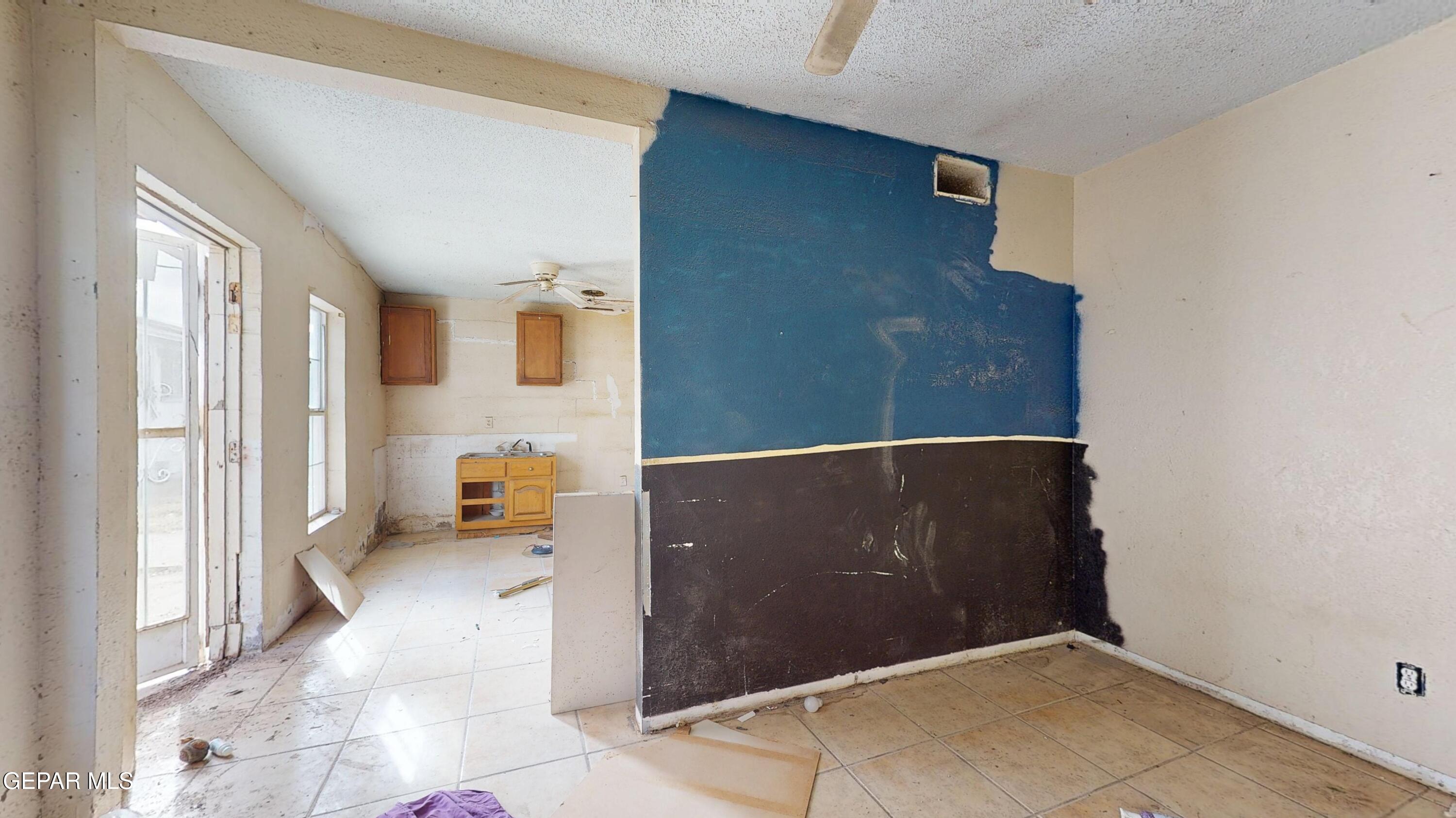 135 Baywood Road El Paso, TX 79915 - Photo 37 of 43 an empty room with windows